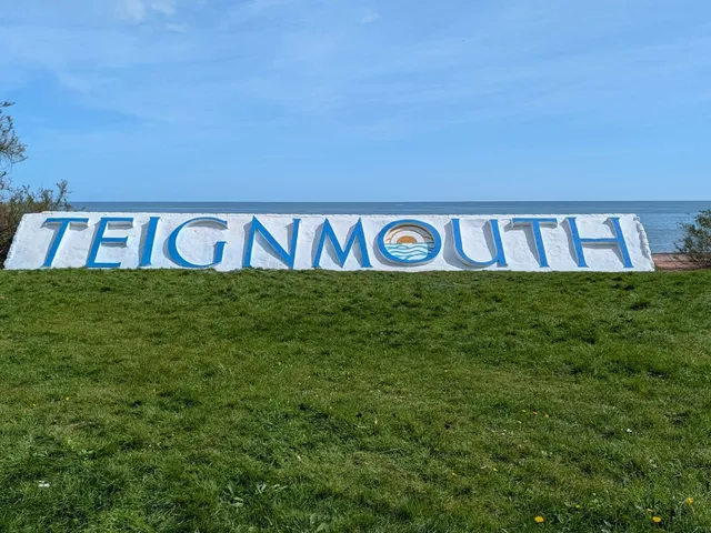 The distinctive Teignmouth town sign on the Devon coast