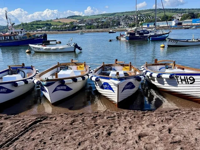 Motor boats for hire on the Point Beach at Teignmouth