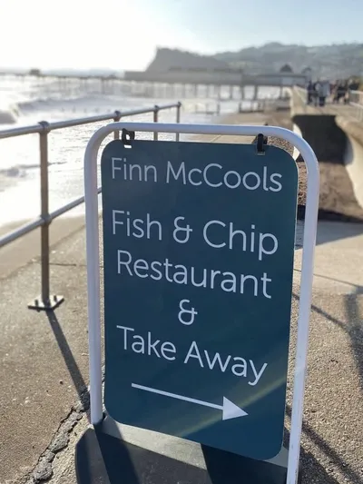 Finn McCools shop sign on the se-front in Teignmouth